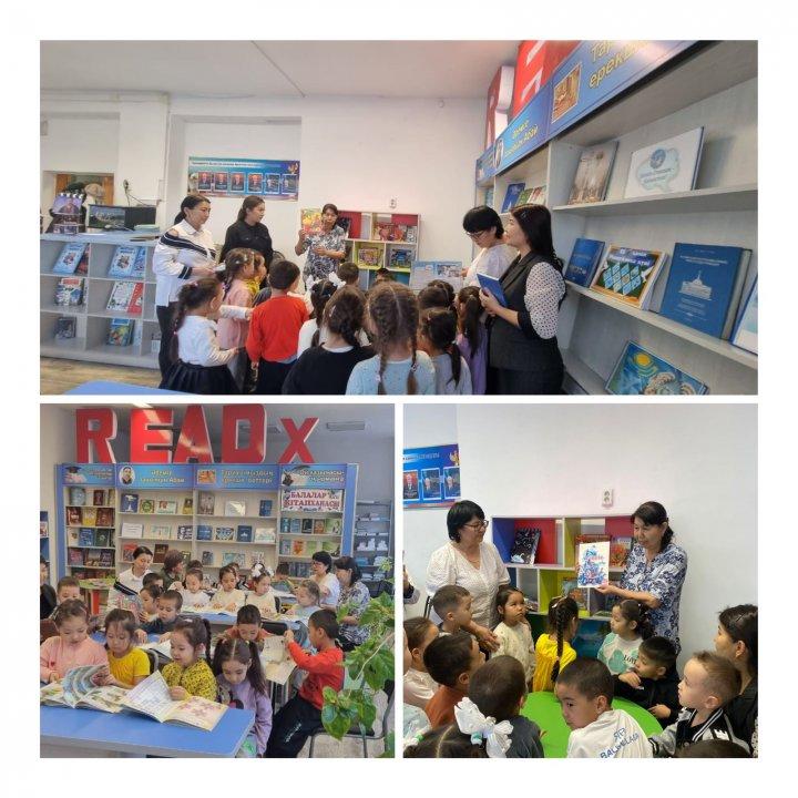 «№7  Ақ бота»  бөбекжайы» ҚМҚК Сәулетай мектепалды тобының тәрбиешілері балаларды мектебіміздің кітапханасына саяхат жасауға алып келді.